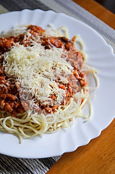Pasta or Spaghetti bolognese with meat, cheese,tomato on a plate