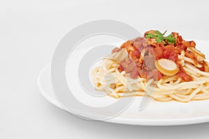 Pasta, Spaghetti bolognese served on a white plate and tomato sauce