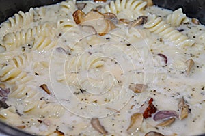 Pasta spaghetti carbonara with cream, mushrooms, bacon