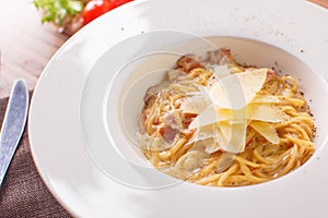 Pasta spaghetti carbonara on white background. Top view