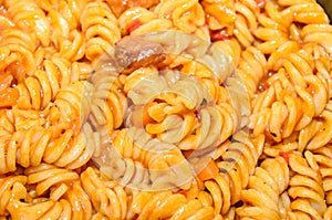 Pasta spaghetti with red tomato sauce,  arrabiata with mushrooms, bacon, parmezan