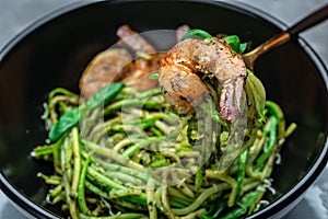 Pasta spaghetti zucchini basil pesto sauce and grilled shrimp, Vegetarian vegetable pasta, Restaurant menu, dieting, cookbook