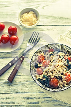 Pasta with spinach and cherry tomatoes