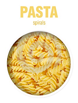 Pasta in a spiral of yellow color, located behind a round hole with shadows from it, are isolated on a white background