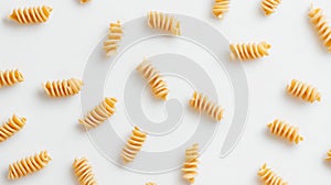 Pasta spirals organic wheat macaroni on white background top view