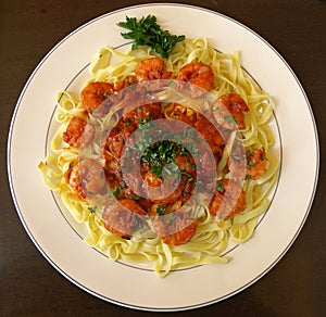 Pasta and stewed tomatoes photo