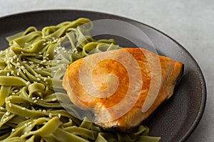 Pasta tagliatelle with red fish Arctic char