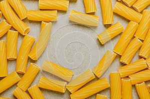 Pasta textured background for menu, website, postcard, decoration. Traditional Italian raw durum wheat pasta