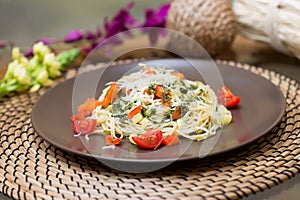 Pasta with tomato cherri and parmesan. Italian quisine photo