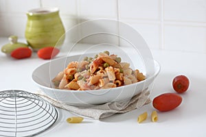 Pasta with tomato sauce and peas