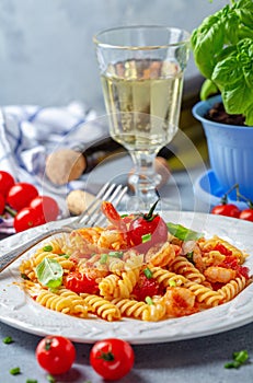 Pasta with tomato sauce and shrimp