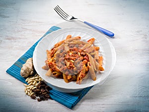 Pasta with tomatoes and dried grape