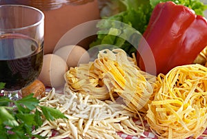 Pasta, vegetables, egg, wine