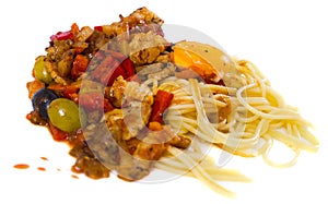 Pasta with vegetables grilled meat and baked egg yolk on a white plate