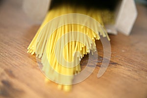 Pastas Spaghetti uncooked on a table healthy natural Ingredient