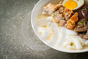 Paste of rice flour or boiled Chinese pasta square in clear soup