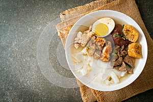 Paste of rice flour or boiled Chinese pasta square in clear soup