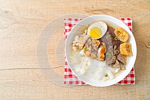 Paste of rice flour or boiled Chinese pasta square in clear soup