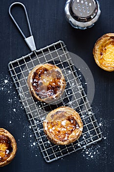 Pasteis de Nata on a Cooling Rack photo