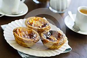 Pasteis de Nata or Portuguese Custard Tarts in Cafe