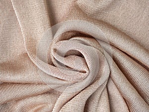 Pastel backdrop with curves, luxury fashion. Smooth elegant wrinkled fabric background. Abstract crumpled texture. Cream