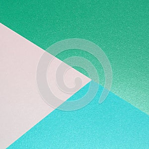 Pastel background flat design. Green, blue and silver glitter paper texture for copy space text and object. Flat lay festive event