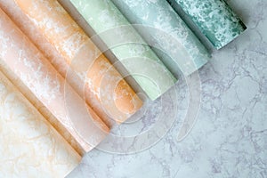 A pastel background with subtle marble patterns in muted peach, pale lilac, and pastel green for a