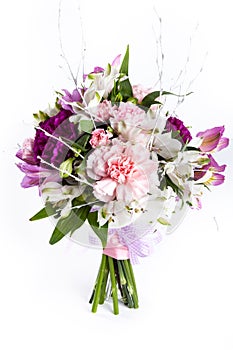 Pastel bouquet from pink and purple gillyflowers on white