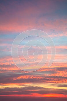 Pastel colors of Real sundown sunset sky with beautiful light clouds without any birds