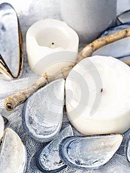 Pastel coloured beach themed wedding table setting shallow depth of field.