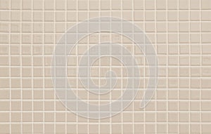 Pastel cream ceramic wall and floor tiles mosaic abstract background. Design geometric wallpaper texture decoration bedroom.