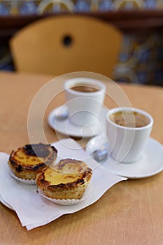 Pastel de nata and coffee photo