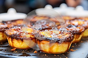 Pastel de Nata or pastel de BelÃÂ©m, a Portuguese egg custard tart pastry photo