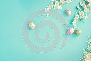 Pastel Easter Eggs and Flowers Background