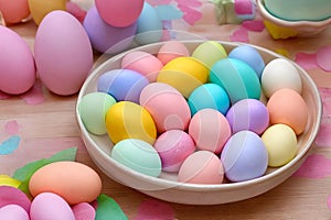 Pastel Easter Palette. A visually pleasing composition featuring a gradient of pastel-colored Easter decorations such as