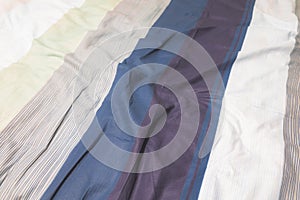 pastel fabric sheet bed smooth waved texture surface background texture perspective