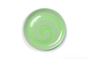 Pastel green plate isolated on white background