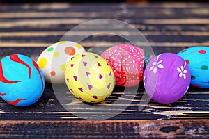 Pastel Hand painted Easter Eggs with pink background