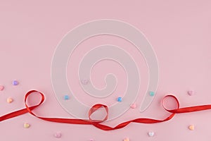 Pastel heart pattern decorate with red ribbon