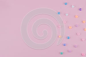 Pastel heart pattern on pink background