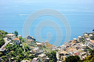 Pastel houses of Corniglia, one of the five centuries-old villages of Cinque Terre, located on rugged northwest coast of Italian