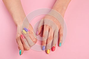 Pastel manicure on female hands.