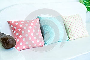 pastel pillow on sofa