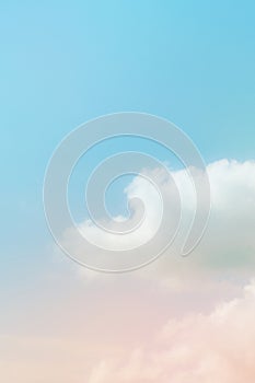 Pastel pink blue gradient sky with clouds background