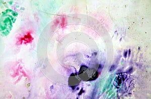 Pastel purple phosphorescent green colorful mix painting spots background, paint and water