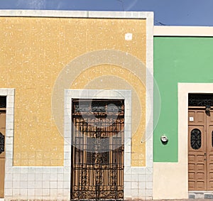 Pastel rainbow doorways in Campeche Mexico