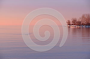 Pastel shades of dawn on Lake Ontario and Mystic Point