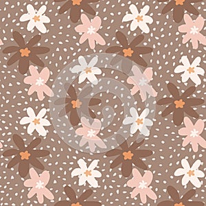 Pastel tones naivy seamless pattern with daisy silhouettes. Brown,pink and white flowers on background with dots