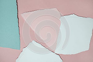 Pastel torn paper texture on mood board. Art background.