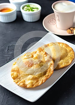 Pastelito traditional venezuelan food with coffee and sauce